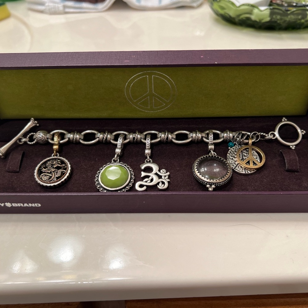 Lucky Brand Charm Bracelet, Toggle Clasp, silver tone w/ gold tone peace charms